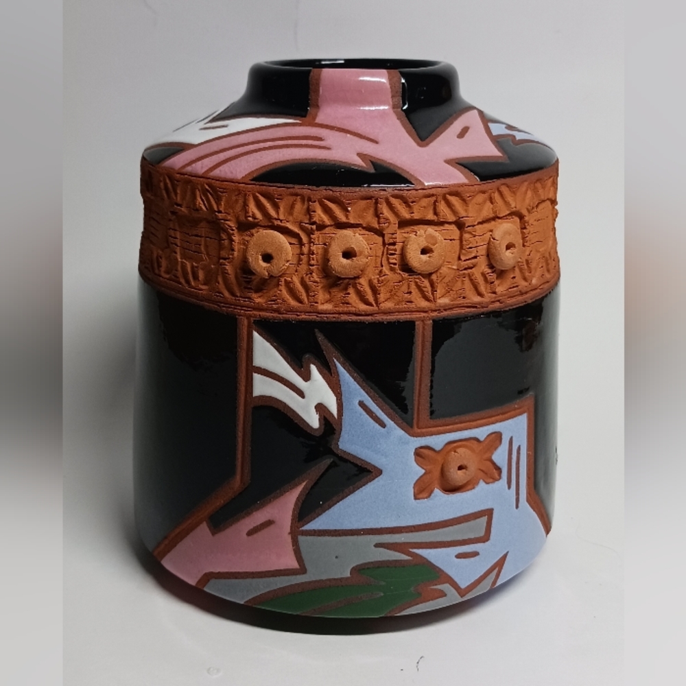 5.5" Pottery vase with glazed and non-glazed design